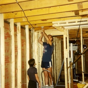 Dad and Greg (10.5 yrs) working on basement wiring 8-88